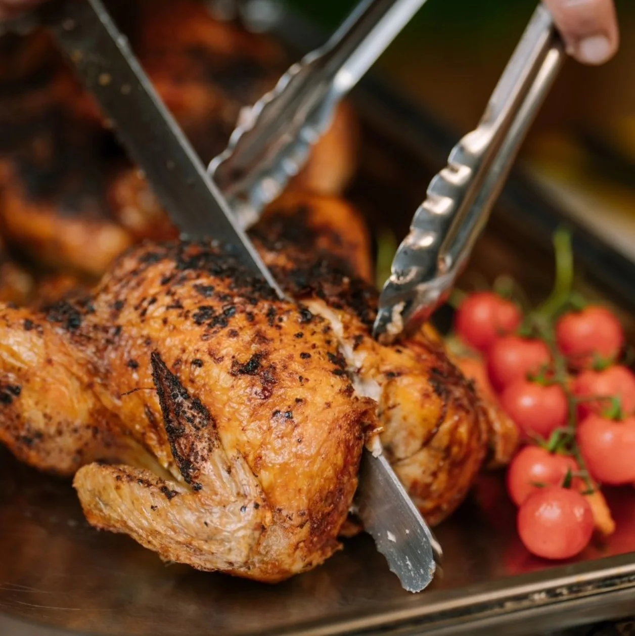 Roast chicken being carved for Sunday lunch